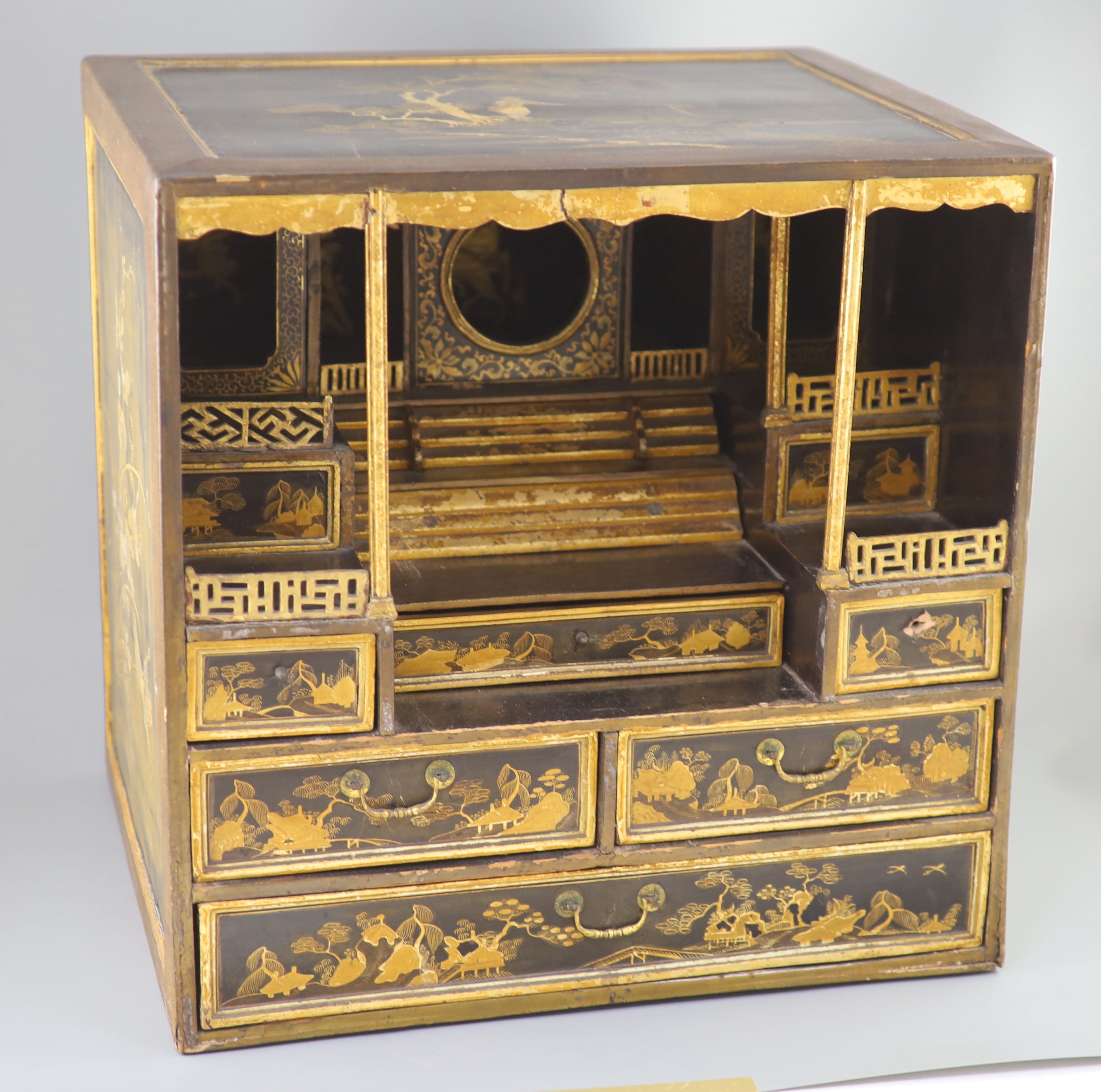 A Japanese gilt decorated black lacquer shrine cabinet, 19th century, 46cm high, 46cm wide, 38cm deep, Provenance - A. T. Arber-Cooke